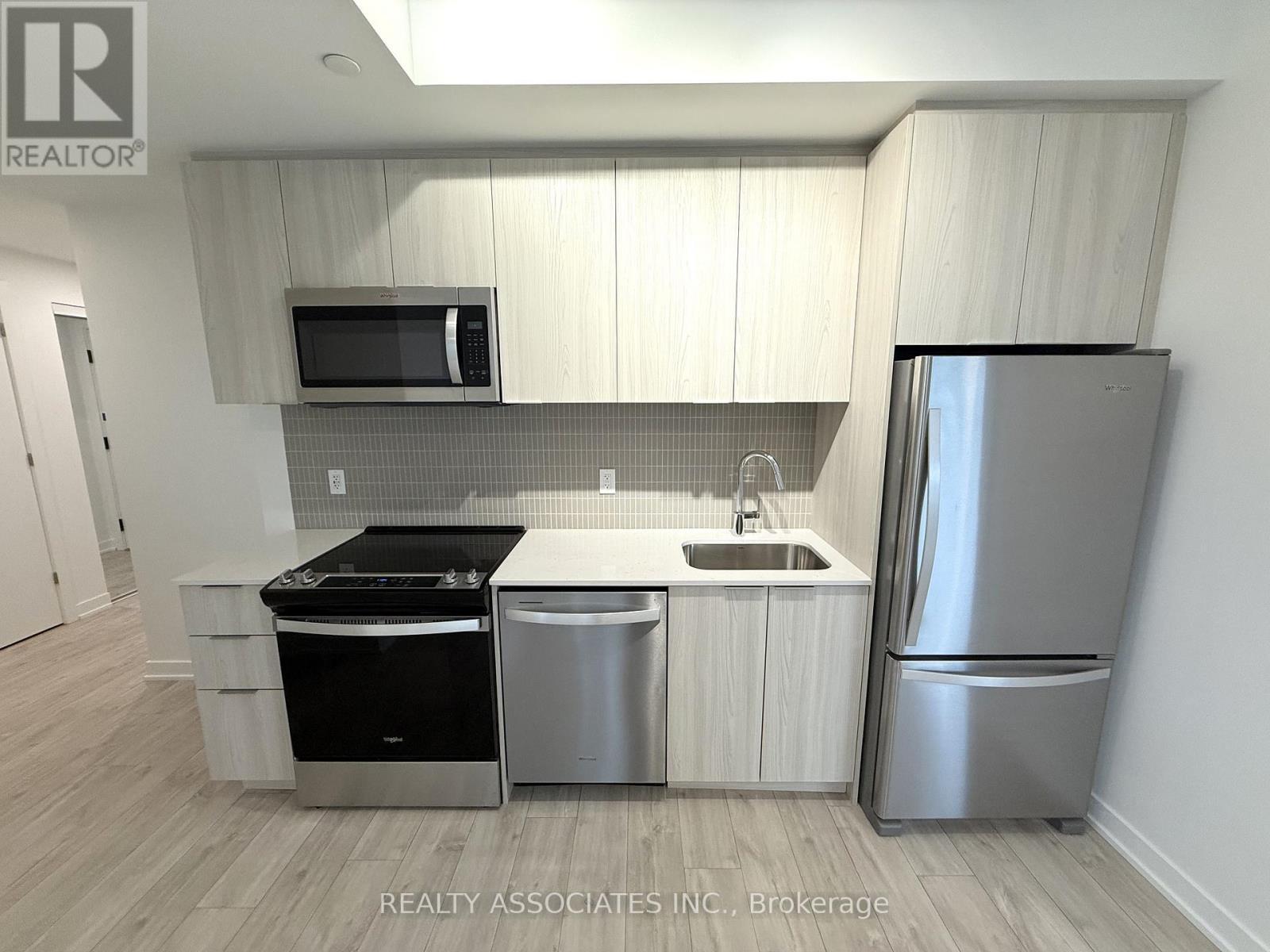 203 - 720 Whitlock Avenue, Milton, ON - Indoor Photo Showing Kitchen With Stainless Steel Kitchen