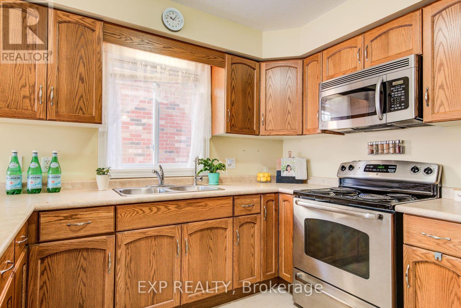 36 Washburn Drive, Guelph, ON - Indoor Photo Showing Kitchen With Double Sink