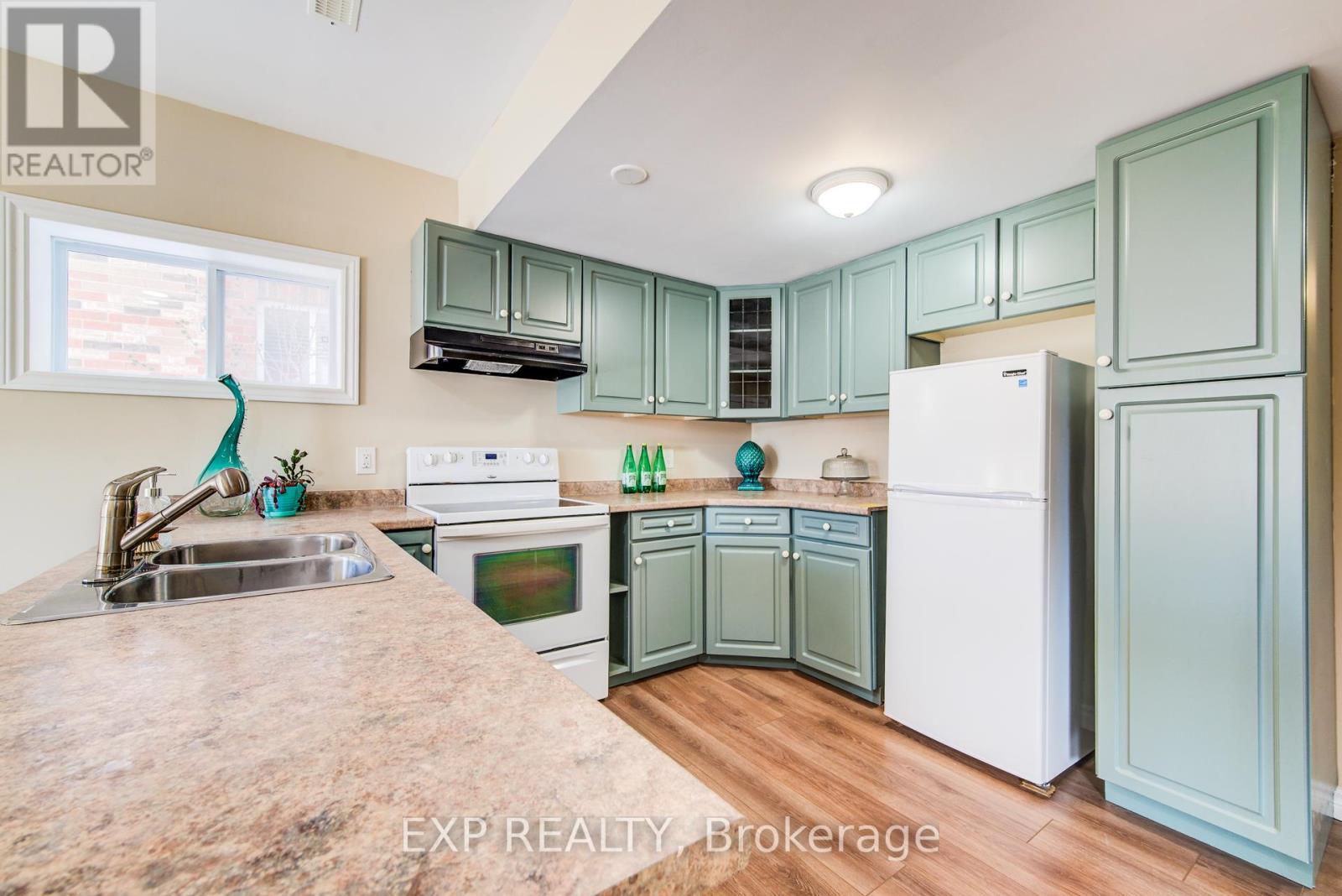 36 Washburn Drive, Guelph, ON - Indoor Photo Showing Kitchen With Double Sink