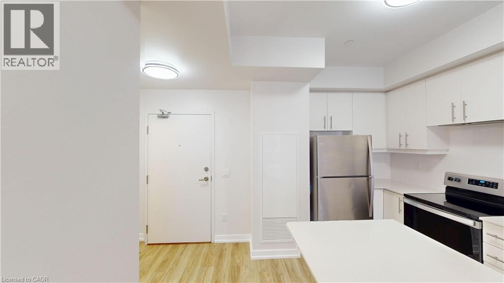 251 Northfield Drive E Unit# 410, Waterloo, ON - Indoor Photo Showing Kitchen With Stainless Steel Kitchen