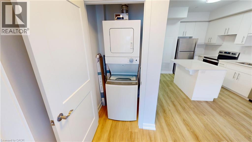 251 Northfield Drive E Unit# 410, Waterloo, ON - Indoor Photo Showing Kitchen With Double Sink