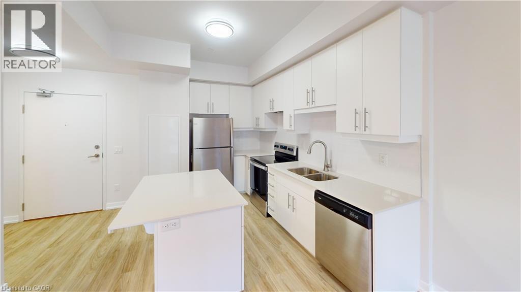 251 Northfield Drive E Unit# 410, Waterloo, ON - Indoor Photo Showing Kitchen With Stainless Steel Kitchen With Double Sink