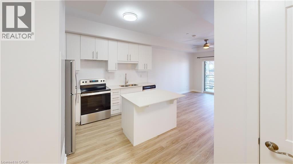 251 Northfield Drive E Unit# 410, Waterloo, ON - Indoor Photo Showing Kitchen With Upgraded Kitchen