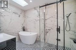 skylight free standing tub -