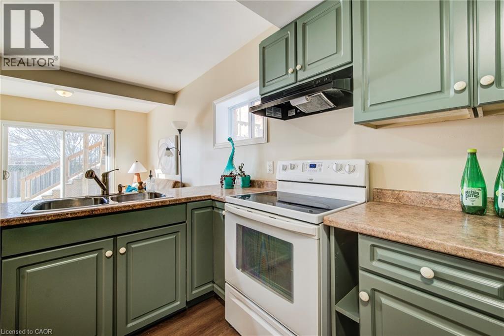 36 Washburn Drive, Guelph, ON - Indoor Photo Showing Kitchen With Double Sink