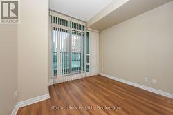 bedroom 2 with walk out to the balcony -