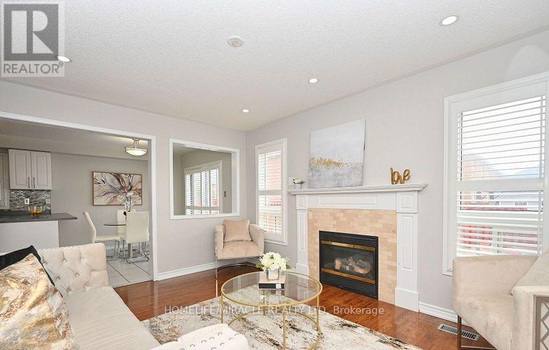 13 Galveston Crescent, Brampton, ON - Indoor Photo Showing Living Room With Fireplace