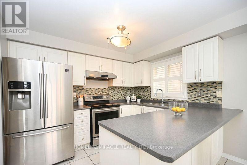 13 Galveston Crescent, Brampton, ON - Indoor Photo Showing Kitchen With Double Sink