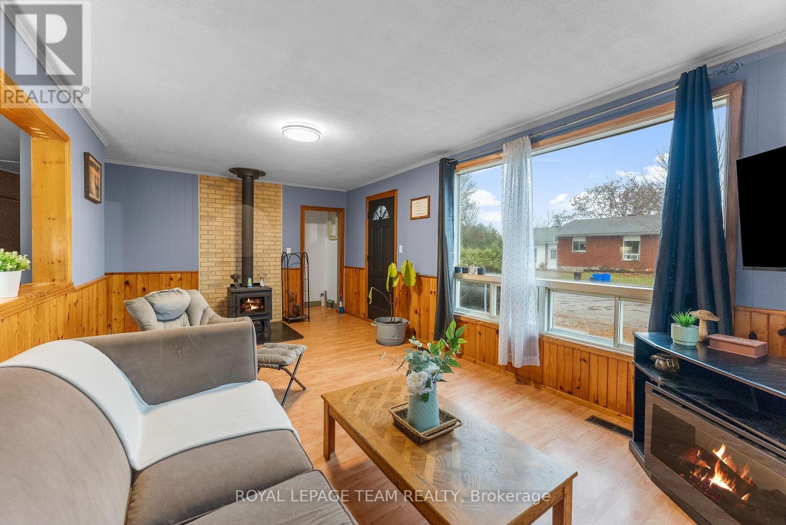 21 Philip Street, Madawaska Valley, ON - Indoor Photo Showing Living Room With Fireplace
