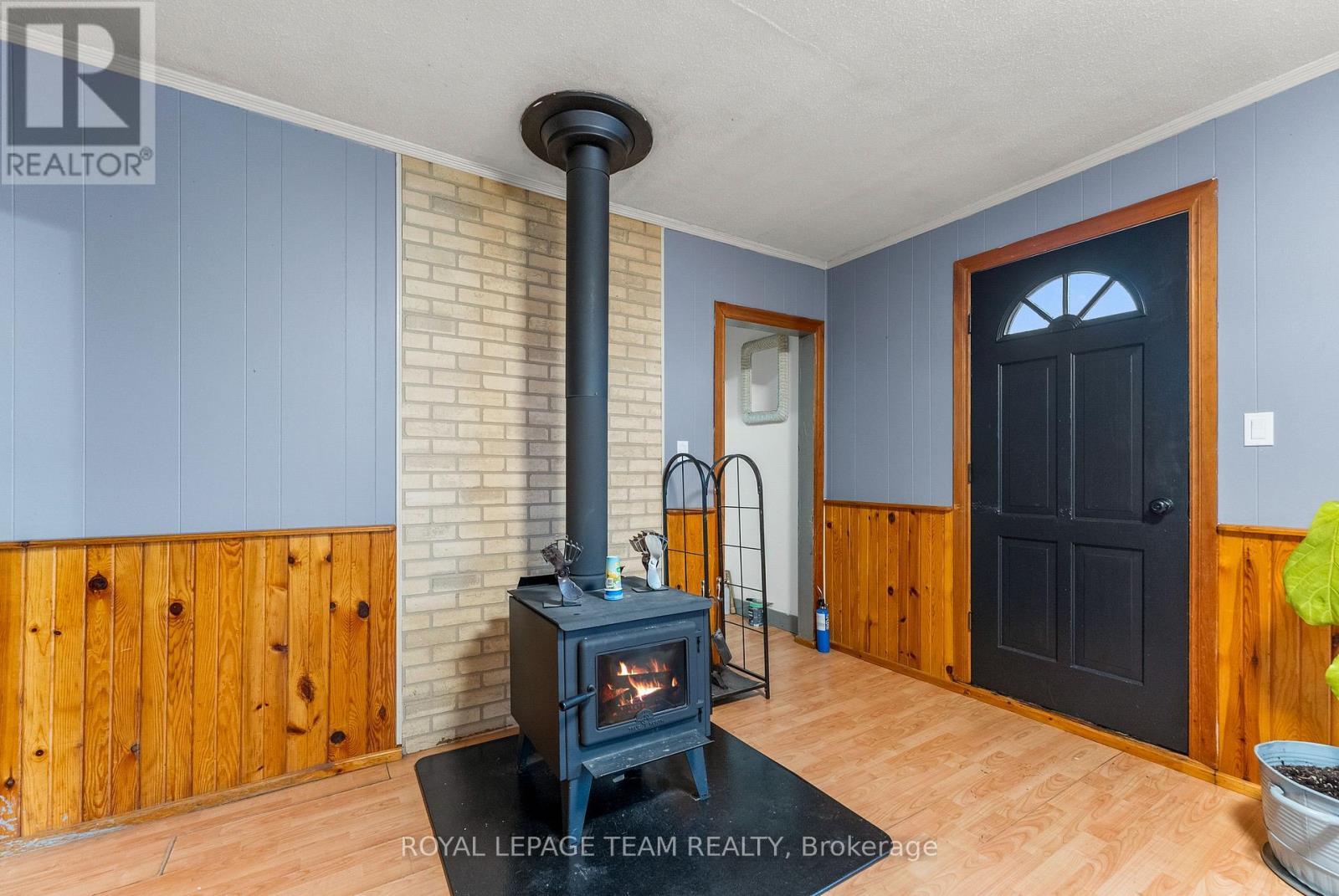 21 Philip Street, Madawaska Valley, ON - Indoor Photo Showing Other Room With Fireplace