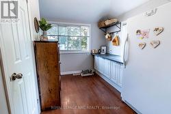 Separate pantry area off the kitchen w/ a 2pc bath -