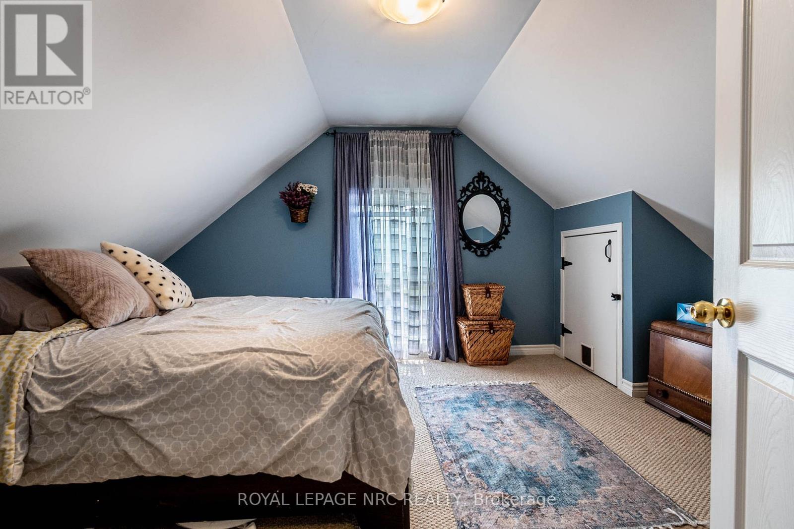 There is a bedroom and also another bonus room - 13 Violet Street, St. Catharines (Grapeview), ON