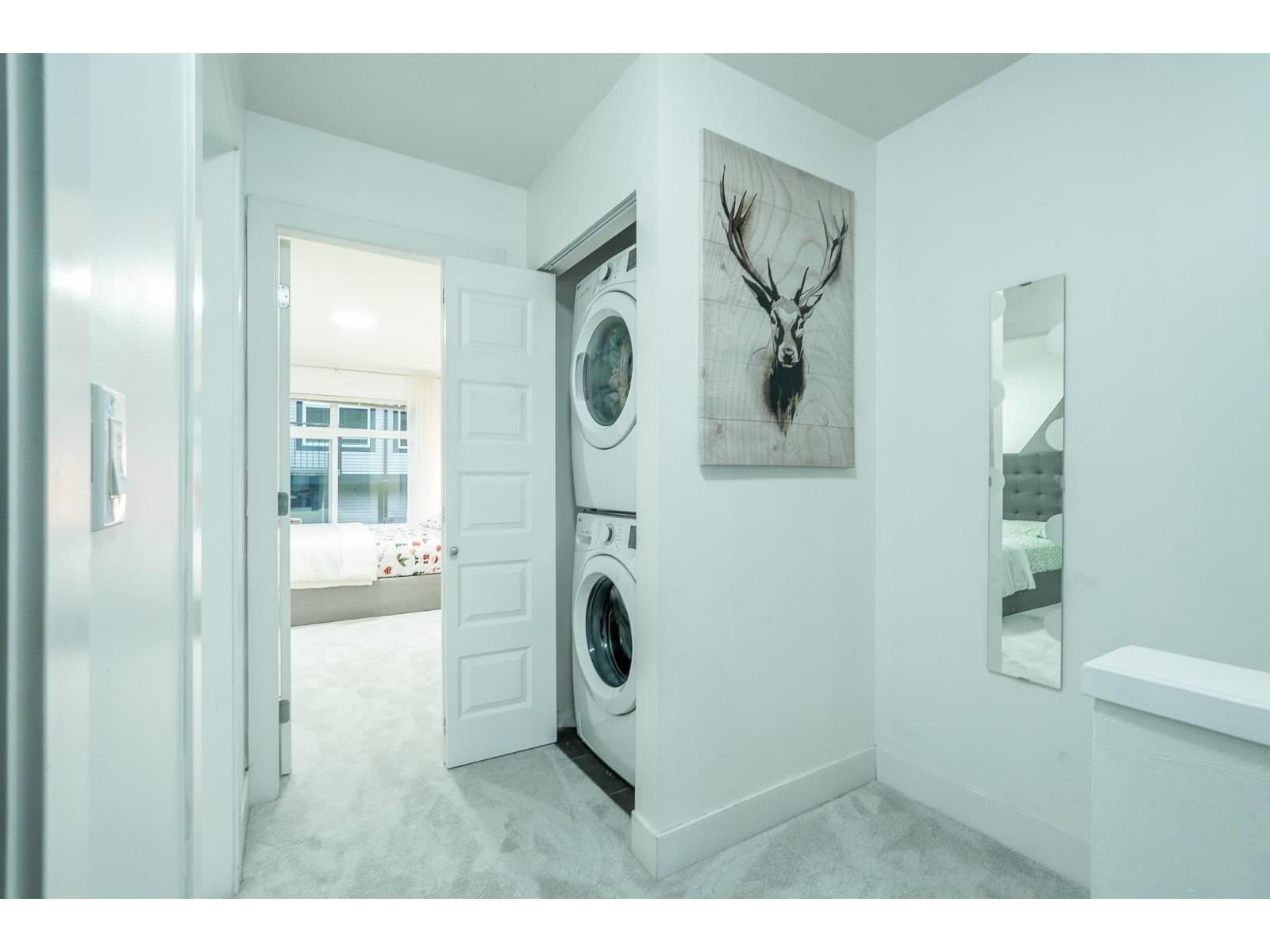 100 6299 144 Street, Surrey, BC - Indoor Photo Showing Laundry Room