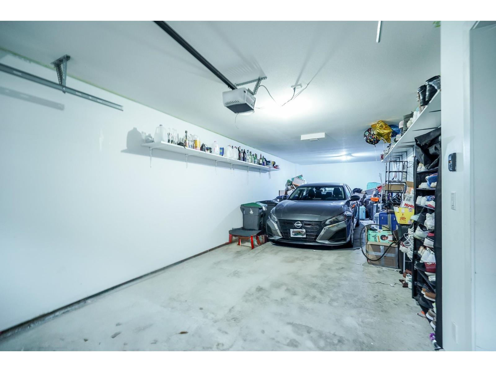 100 6299 144 Street, Surrey, BC - Indoor Photo Showing Garage