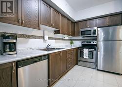 Modern kitchen with stainless steel appliances -