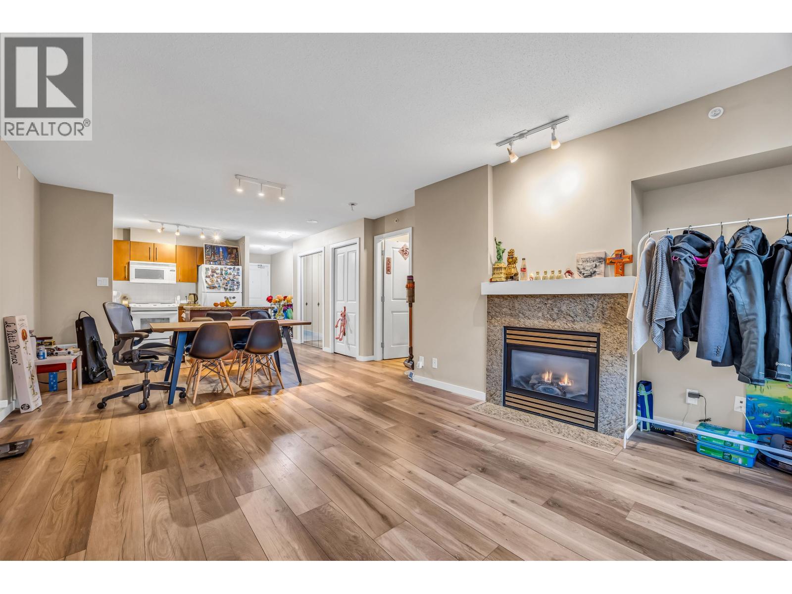 201 2138 Madison Avenue, Burnaby, BC - Indoor Photo Showing Other Room With Fireplace