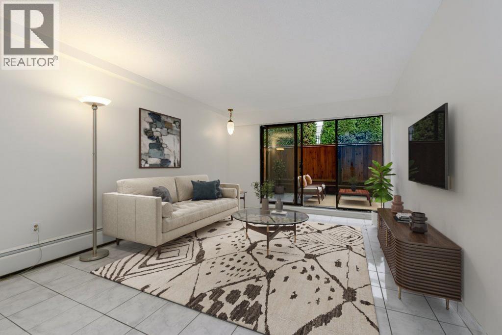 105 1585 E 4Th Avenue, Vancouver, BC - Indoor Photo Showing Living Room