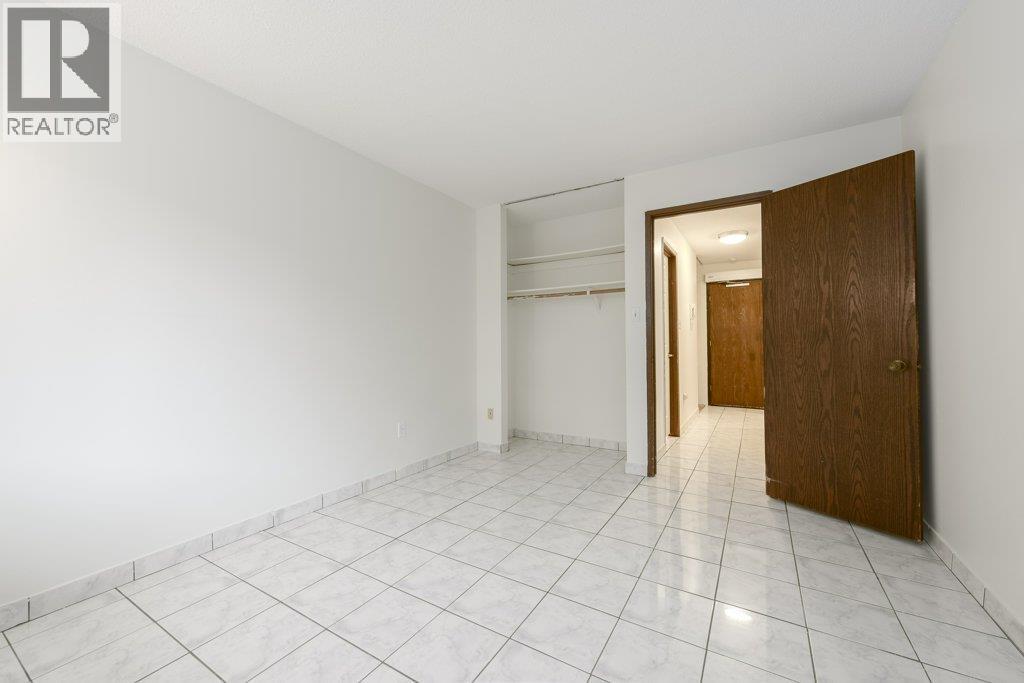 105 1585 E 4Th Avenue, Vancouver, BC - Indoor Photo Showing Other Room