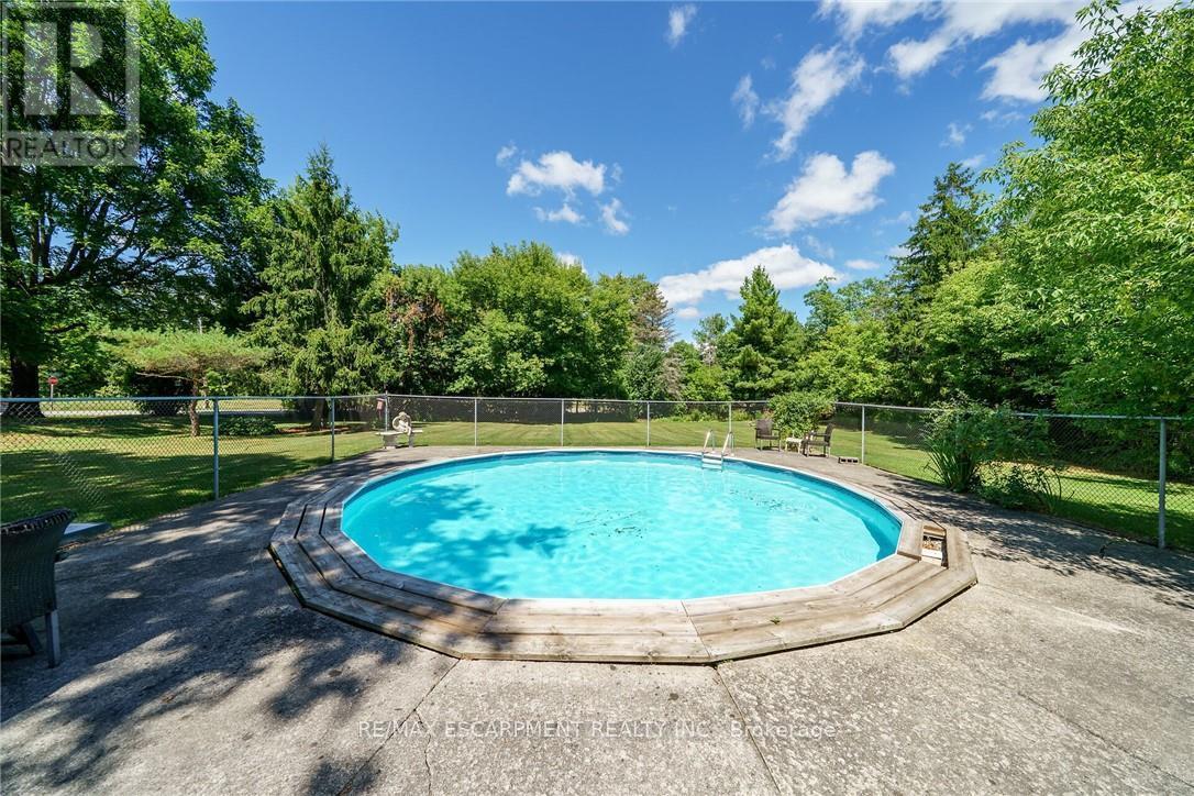 226 Carluke Road E, Hamilton, ON - Outdoor With Above Ground Pool With Backyard