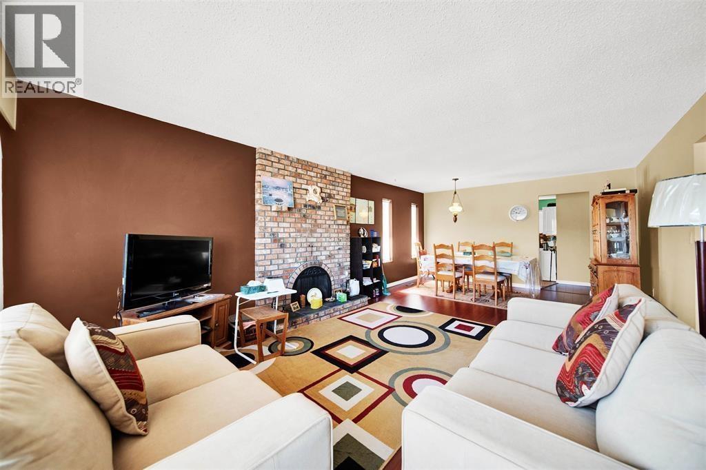 1238 Wise Court, Coquitlam, BC - Indoor Photo Showing Living Room With Fireplace
