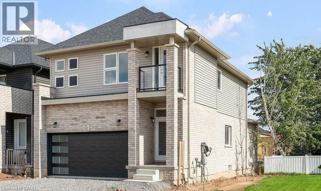 View of front of house with a balcony, brick siding, an attached garage, and gravel driveway - 103 Mclaughlin Street, Welland, ON - Outdoor