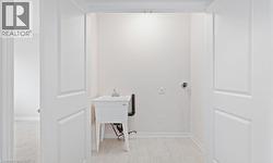 Washroom featuring baseboards -