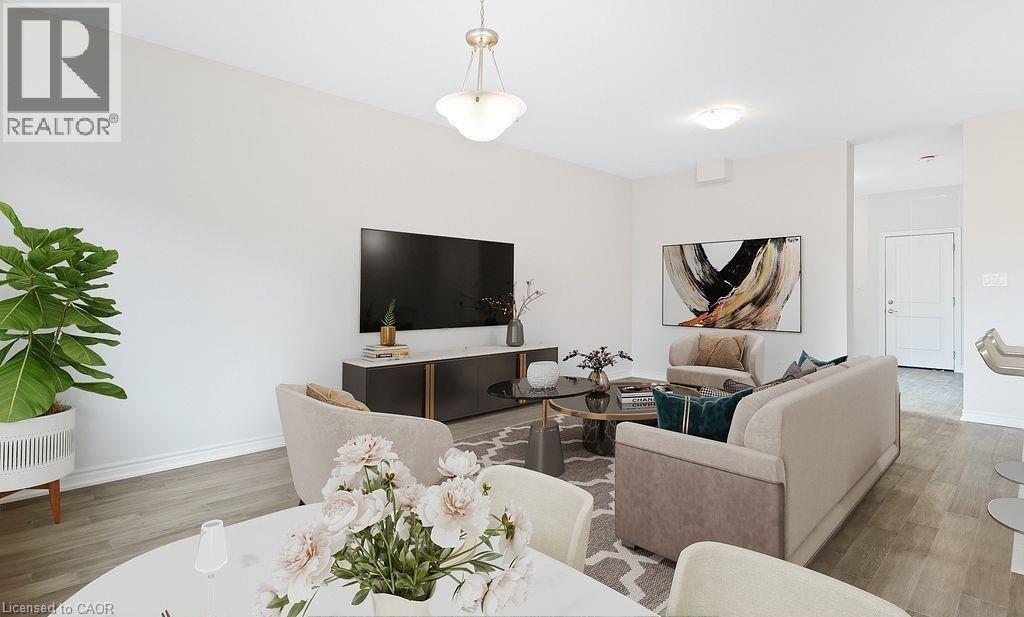 Living area featuring wood finished floors and baseboards - 103 Mclaughlin Street, Welland, ON - Indoor