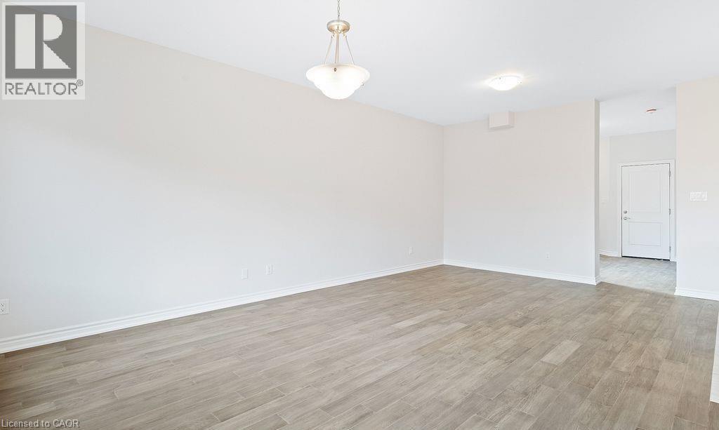 Unfurnished room featuring light wood-style floors - 103 Mclaughlin Street, Welland, ON - Indoor Photo Showing Other Room