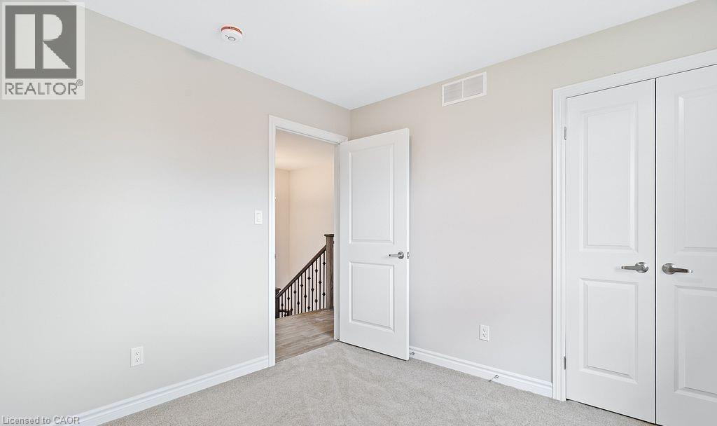 Unfurnished bedroom with carpet floors and a closet - 103 Mclaughlin Street, Welland, ON - Indoor Photo Showing Other Room