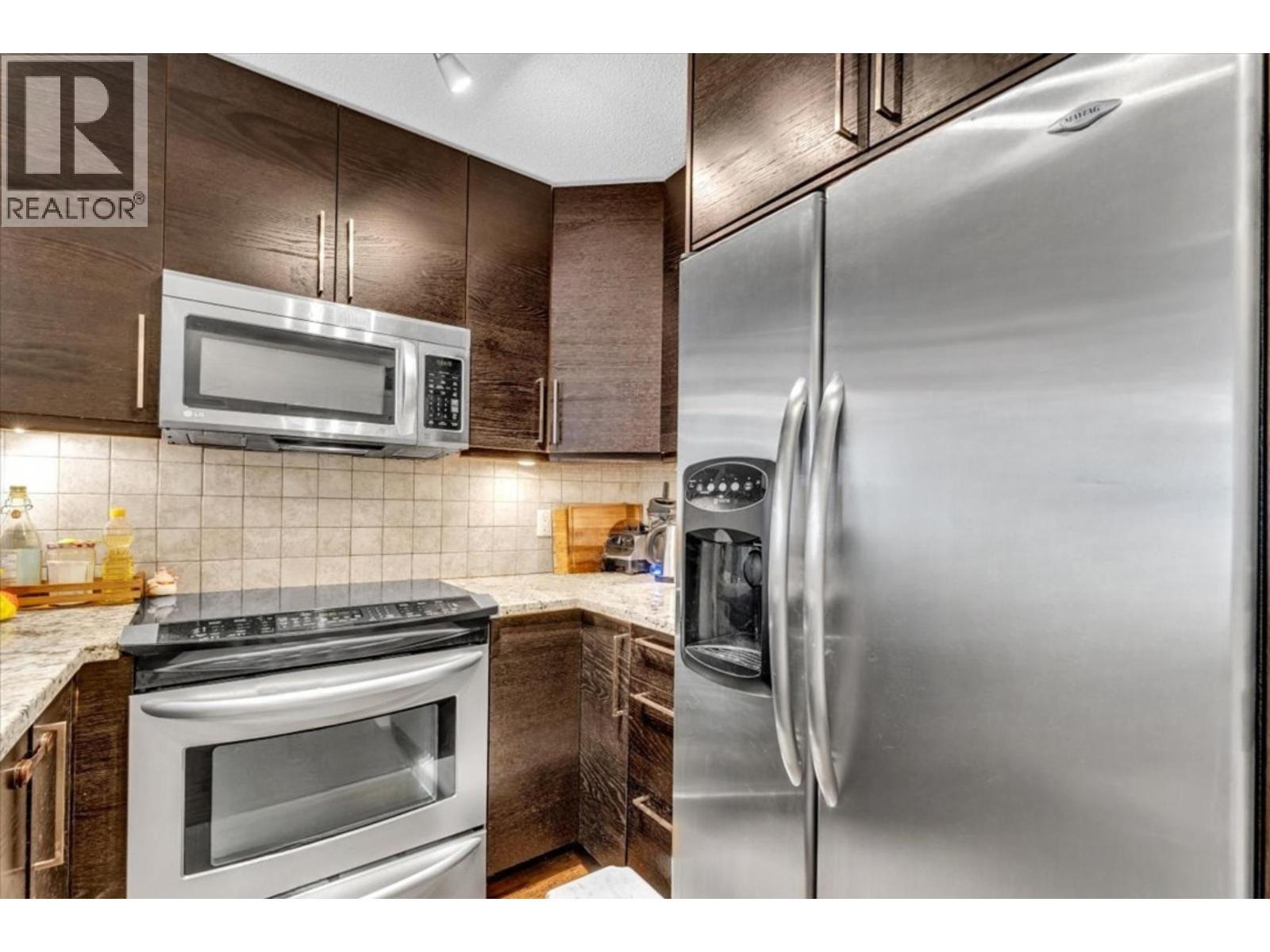 307 876 W 16Th Avenue, Vancouver, BC - Indoor Photo Showing Kitchen With Stainless Steel Kitchen With Upgraded Kitchen