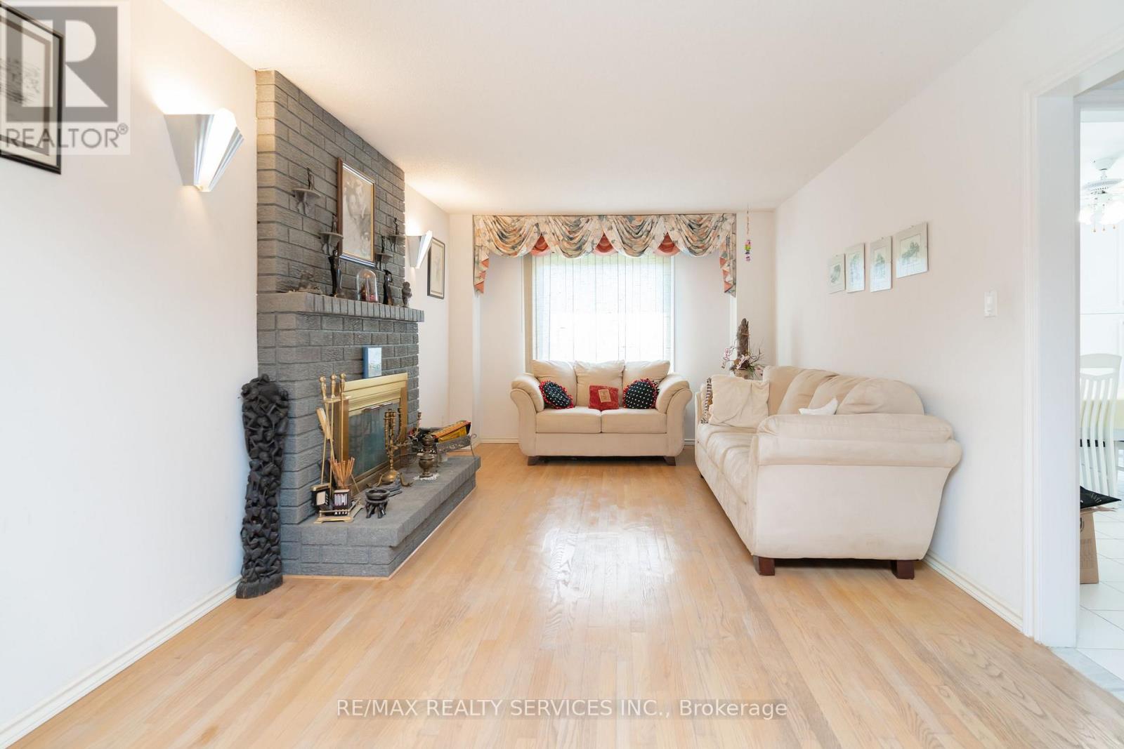 6 Ruth Avenue, Brampton, ON - Indoor Photo Showing Living Room With Fireplace