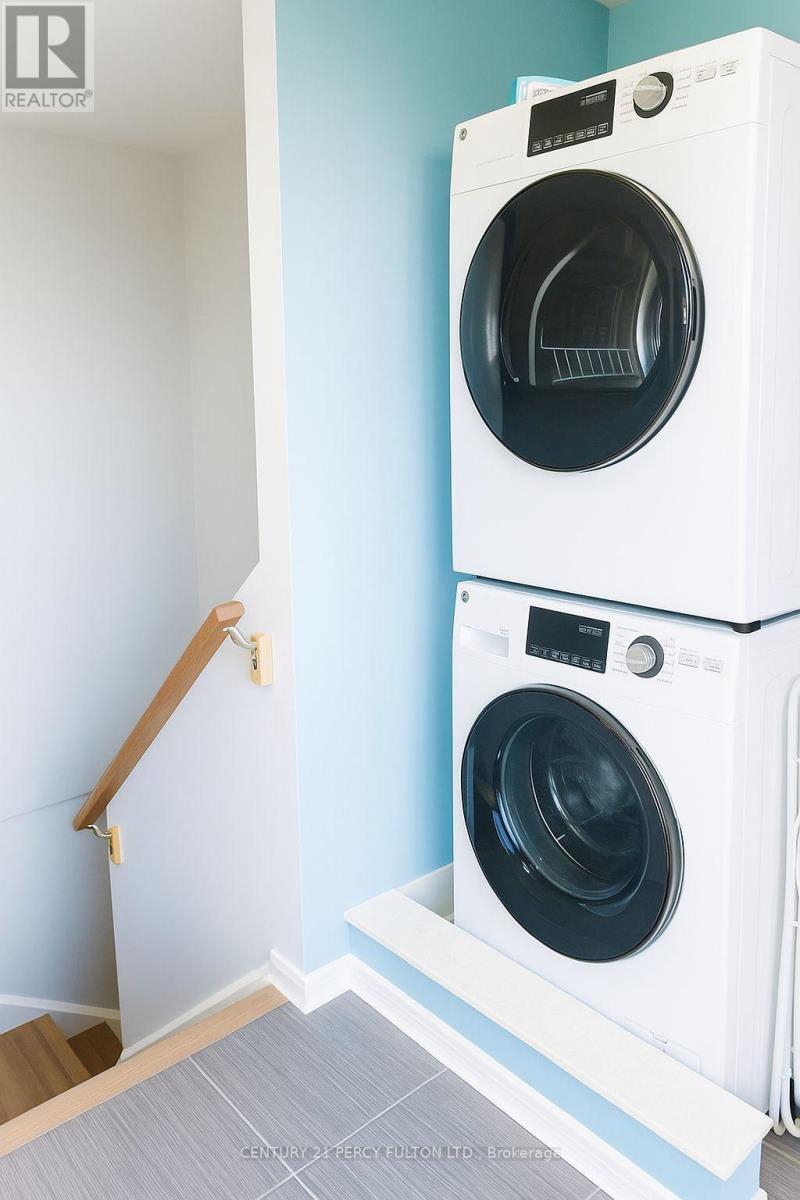 257 - 19 Coneflower Crescent, Toronto, ON - Indoor Photo Showing Laundry Room