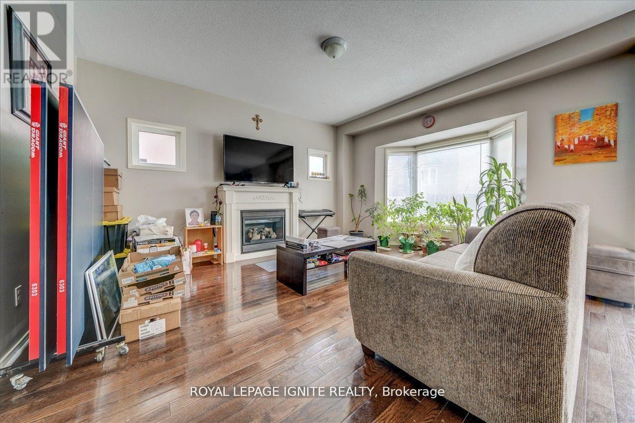 94 Gillett Drive, Ajax, ON - Indoor Photo Showing Living Room With Fireplace