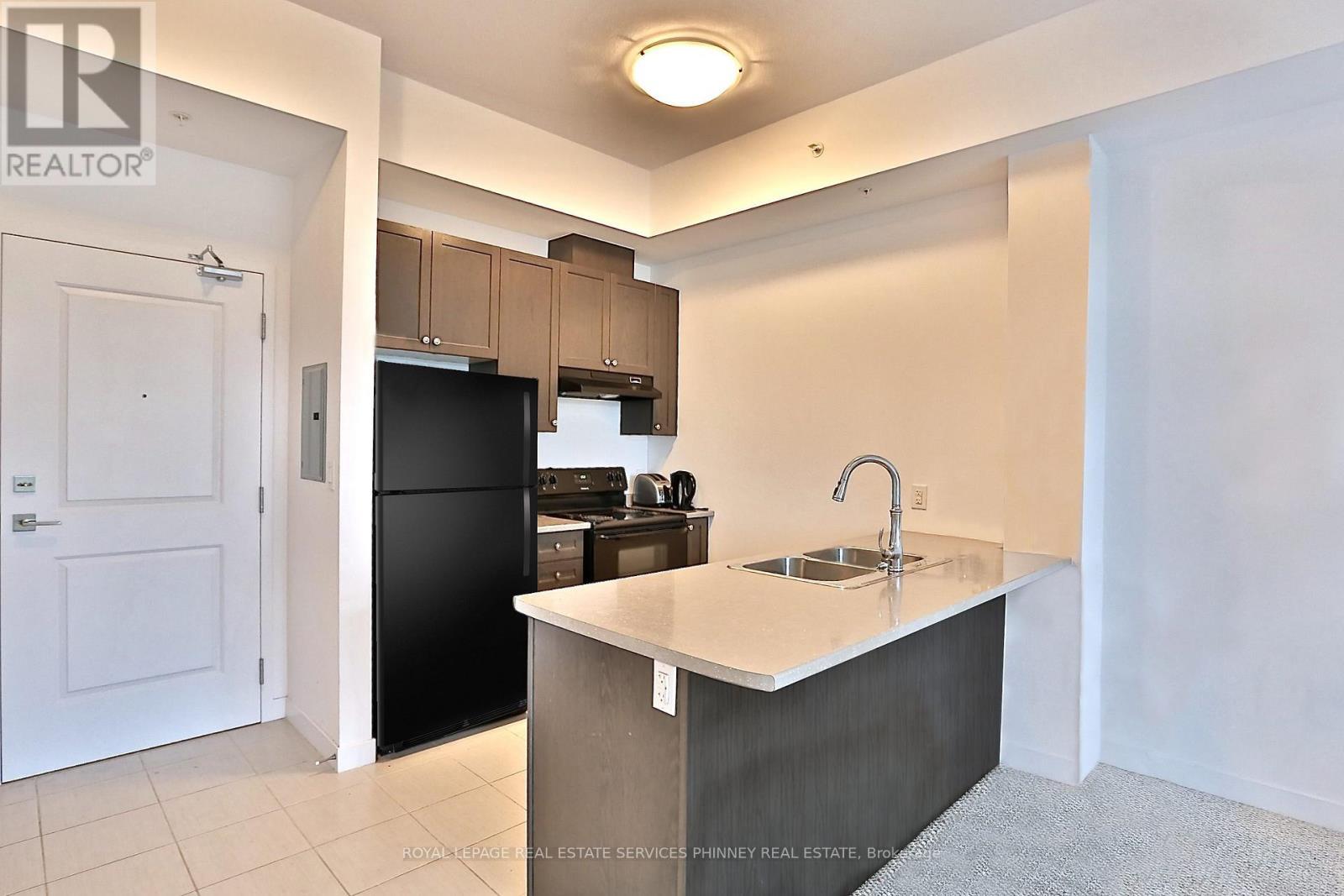 417 - 5020 Corporate Drive, Burlington, ON - Indoor Photo Showing Kitchen With Double Sink