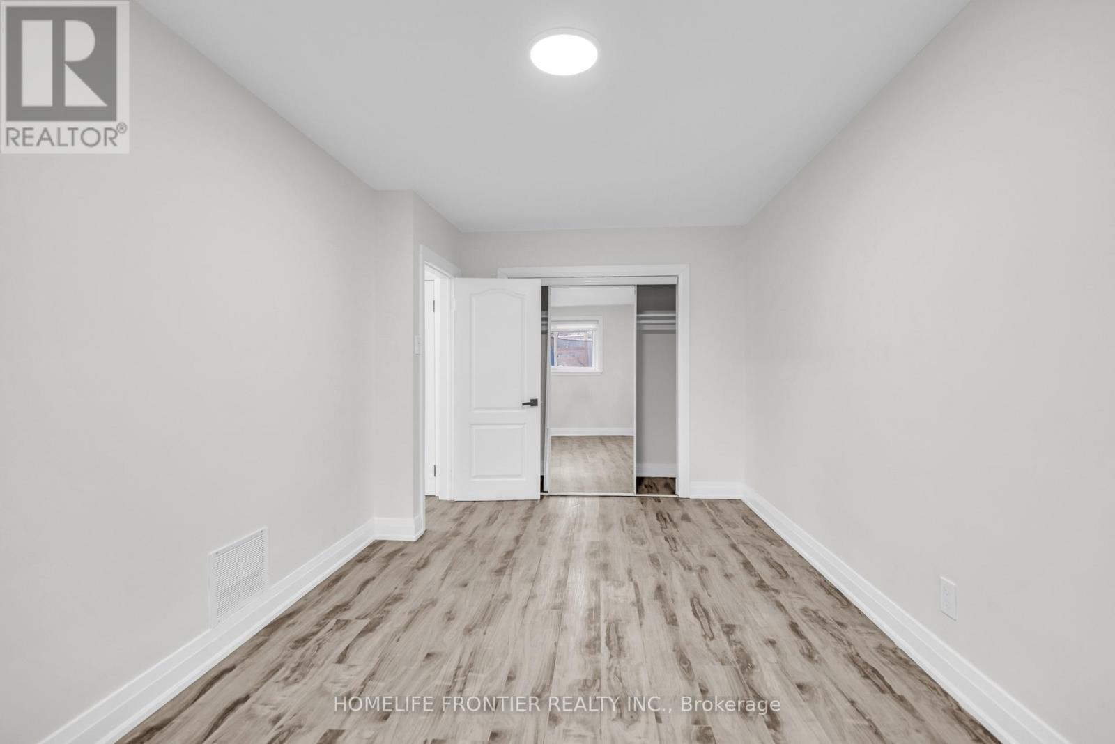 61 Sundial Crescent, Toronto, ON - Indoor Photo Showing Other Room