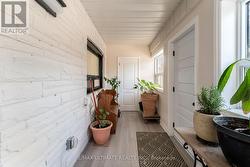 Enclosed porch/mud room with closet -