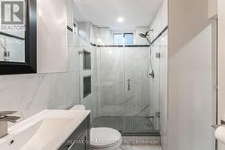 Oversize shower stall with added lower faucet -