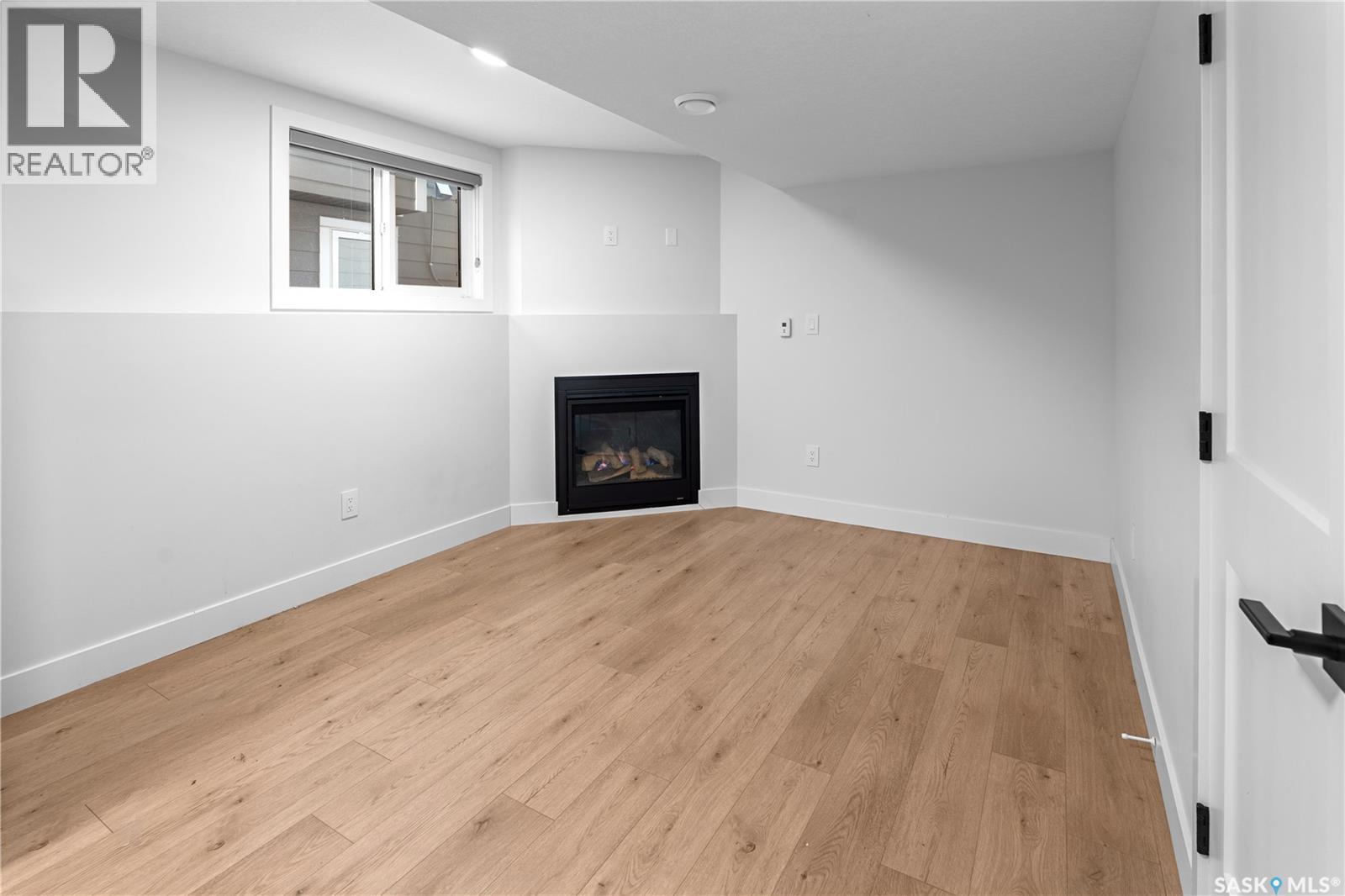 162 Leskiw Lane, Saskatoon, SK - Indoor With Fireplace