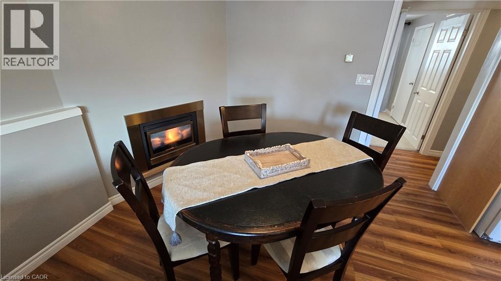101 Lang Crescent Unit# B, Kitchener, ON - Indoor Photo Showing Dining Room With Fireplace