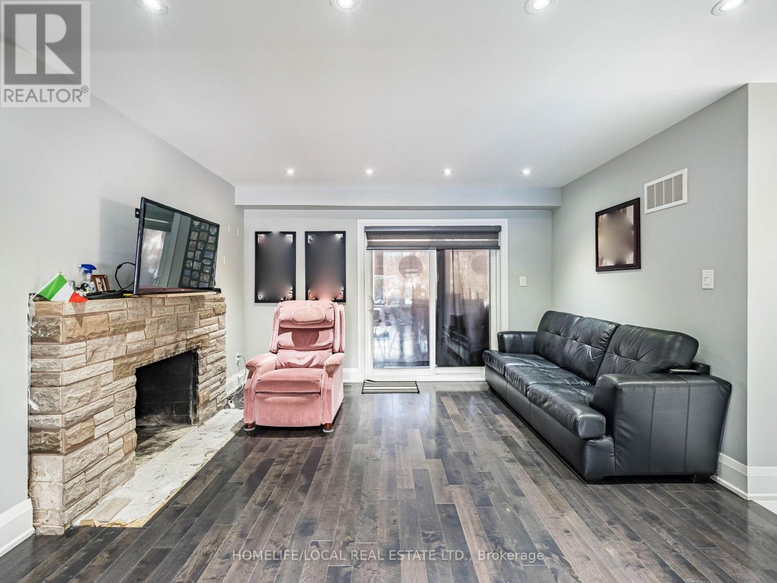 1958 Innisfil Heights Crescent, Innisfil, ON - Indoor Photo Showing Living Room With Fireplace