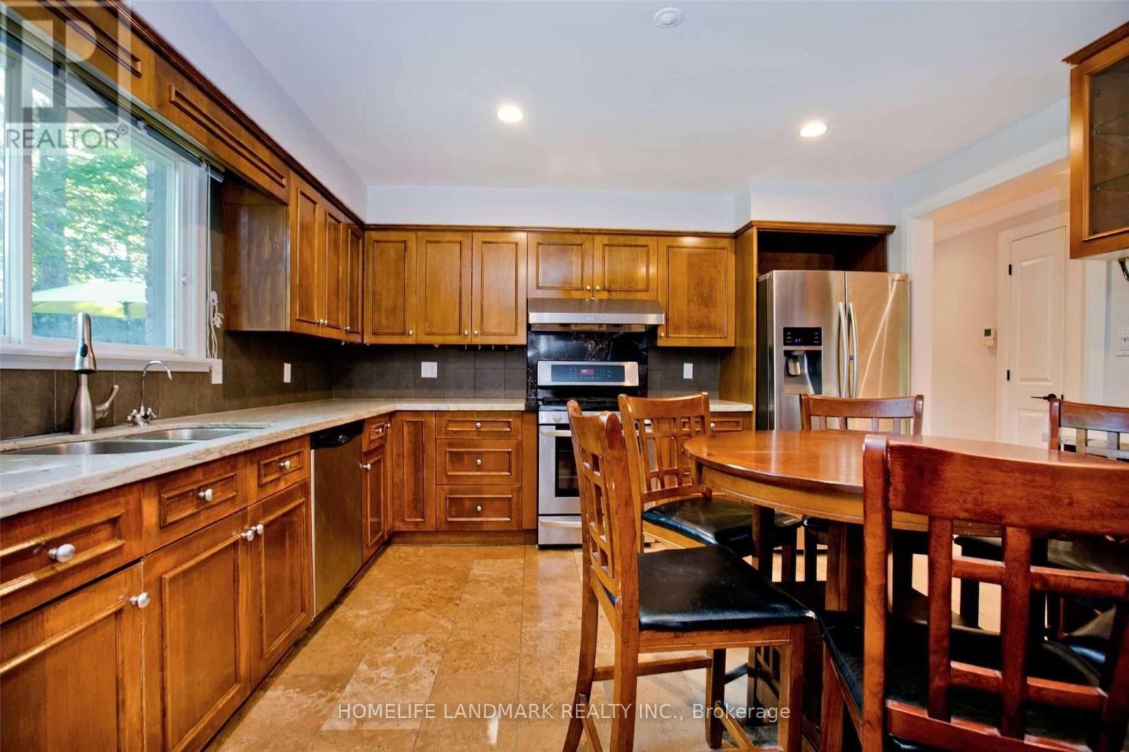 17 Caravan Drive, Toronto, ON - Indoor Photo Showing Kitchen With Double Sink