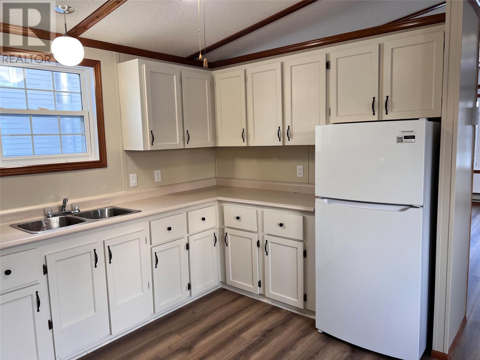 71 Water Street, Bay Roberts, NL - Indoor Photo Showing Kitchen With Double Sink