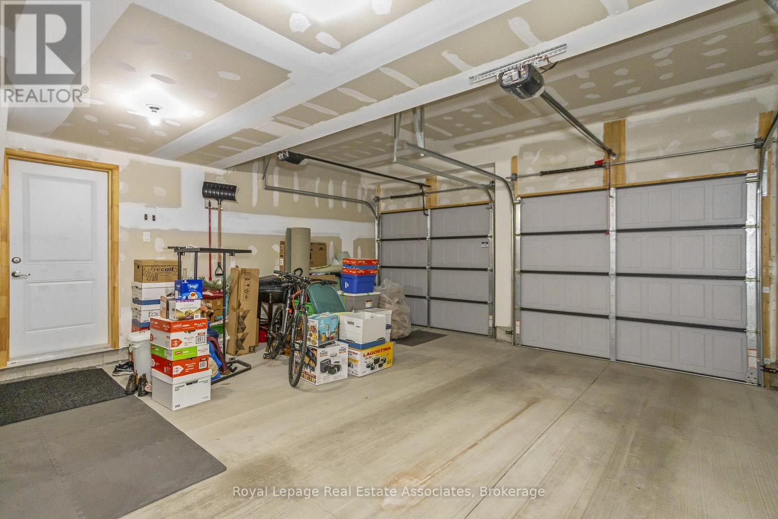 16 - 177 Edgevalley Road, London East, ON - Indoor Photo Showing Garage