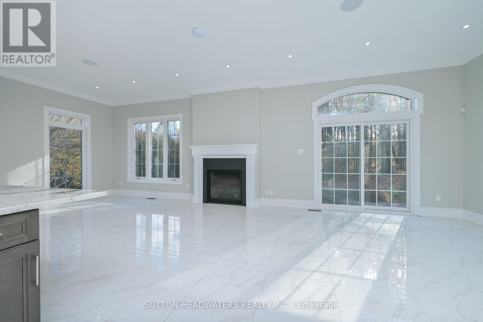 12 Flaherty Lane, Caledon, ON - Indoor With Fireplace