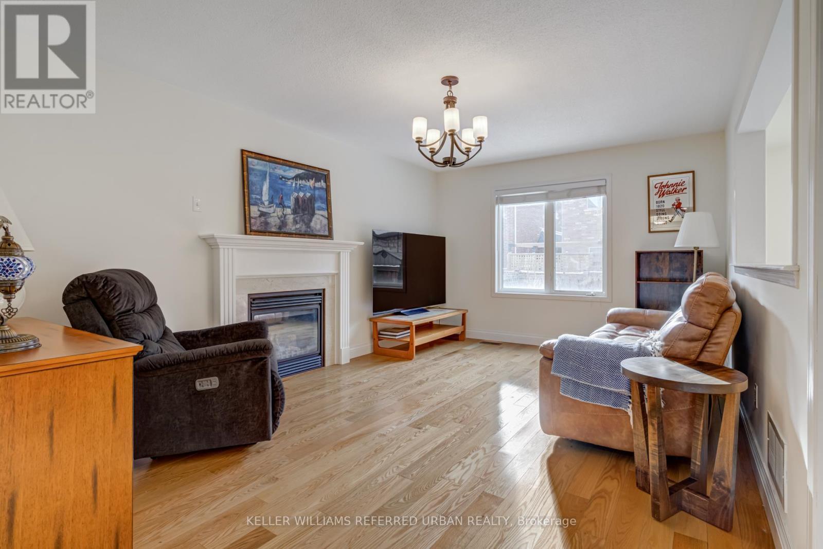 282 Giddings Crescent, Milton, ON - Indoor Photo Showing Living Room With Fireplace