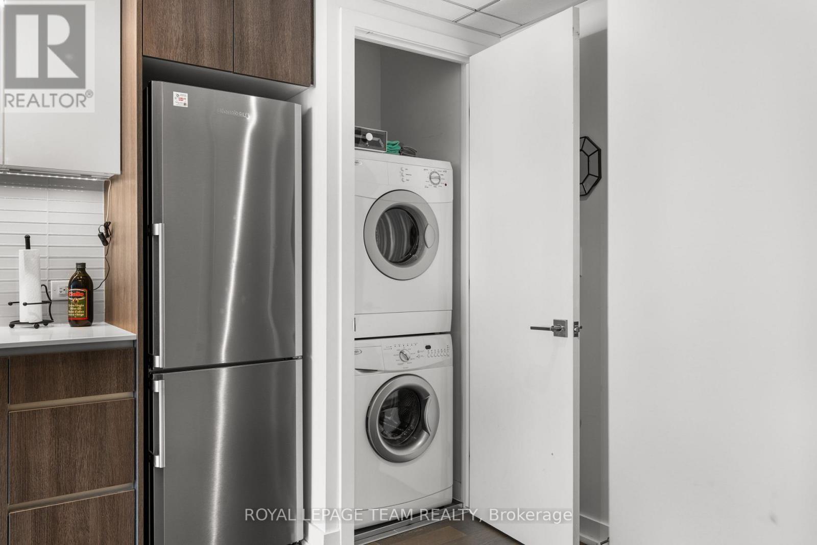 2103 - 199 Slater Street, Ottawa, ON - Indoor Photo Showing Laundry Room