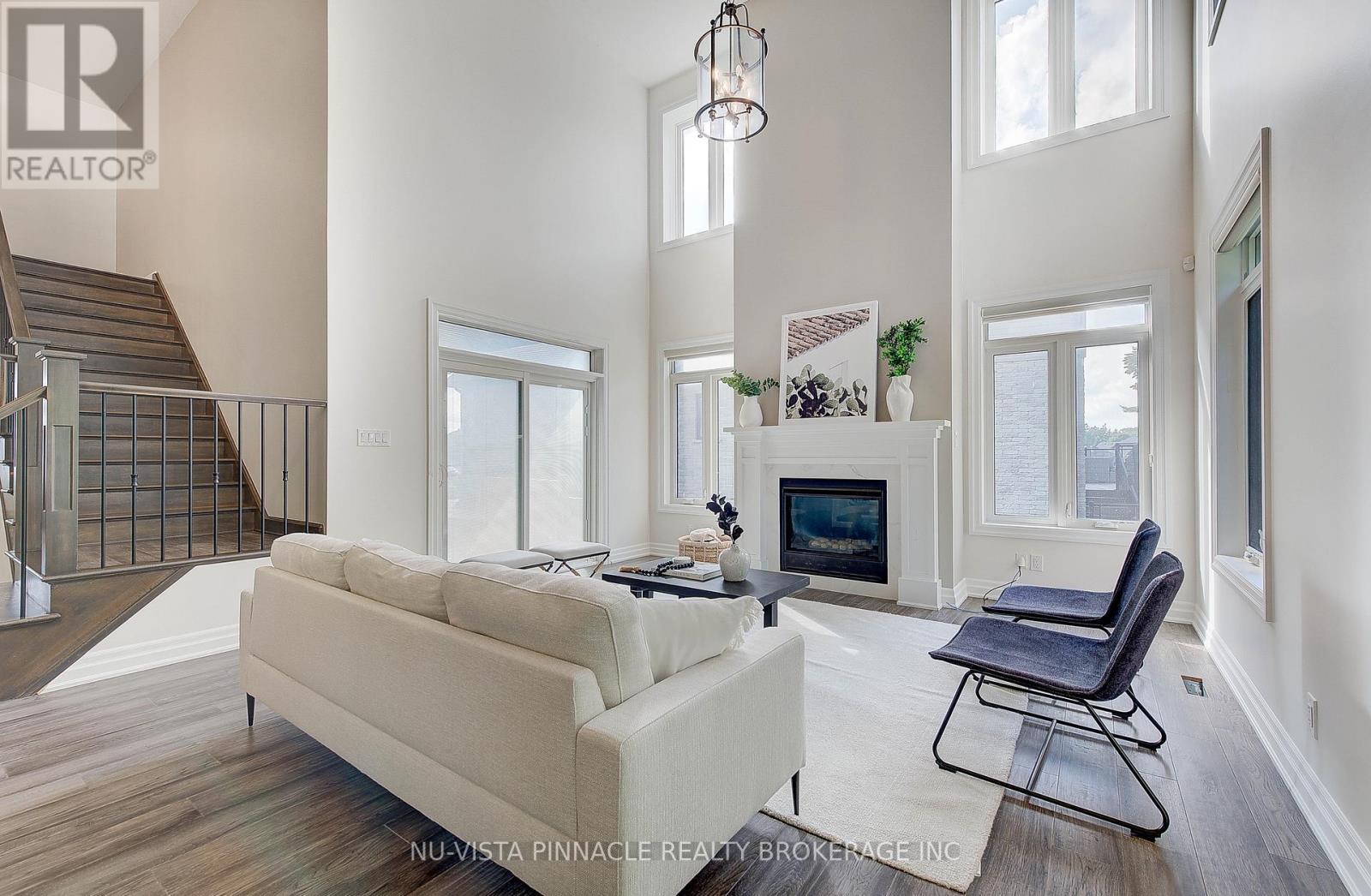 268 Songbird Lane, Middlesex Centre (Ilderton), ON - Indoor Photo Showing Other Room With Fireplace