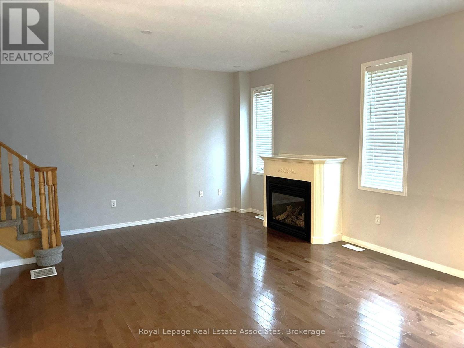 21 Ridgegate Place, Hamilton, ON - Indoor Photo Showing Other Room With Fireplace
