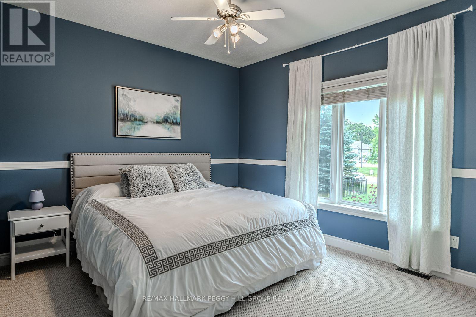 5 Munro Court, Springwater, ON - Indoor Photo Showing Bedroom