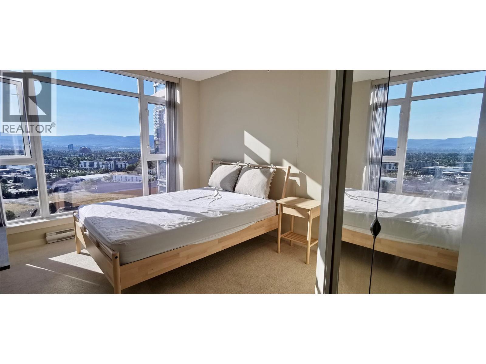 1075 Sunset Drive Unit# 1803, Kelowna, BC - Indoor Photo Showing Bedroom